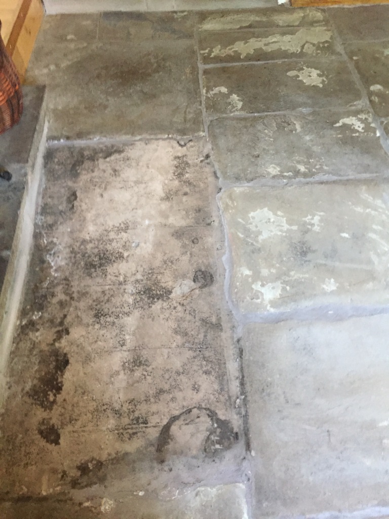 Flagstone floor before restoration in Chorley